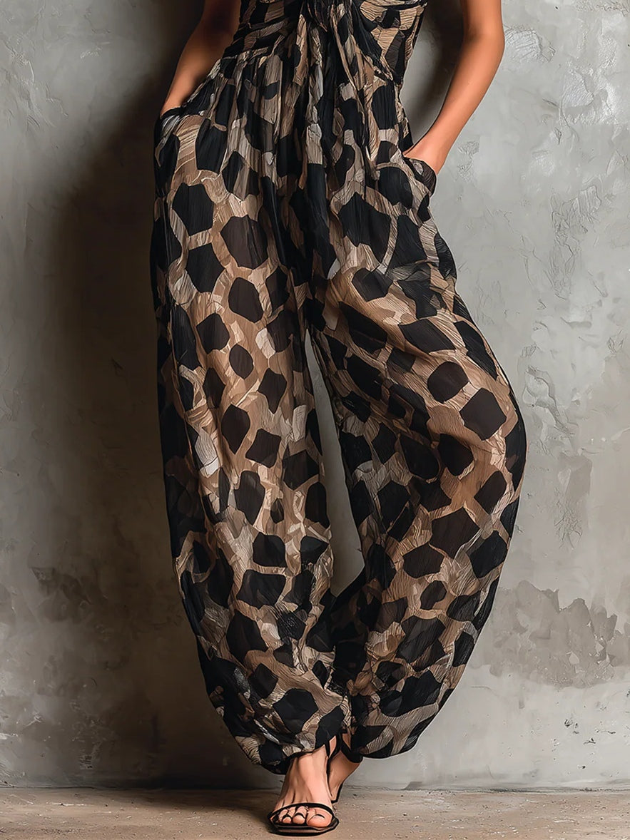Leyre - Mono de gasa negro con estampado animal