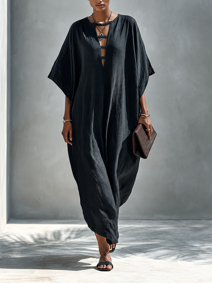 Gabriella | Elegante abito lungo nero con profondo scollo a V e spacco