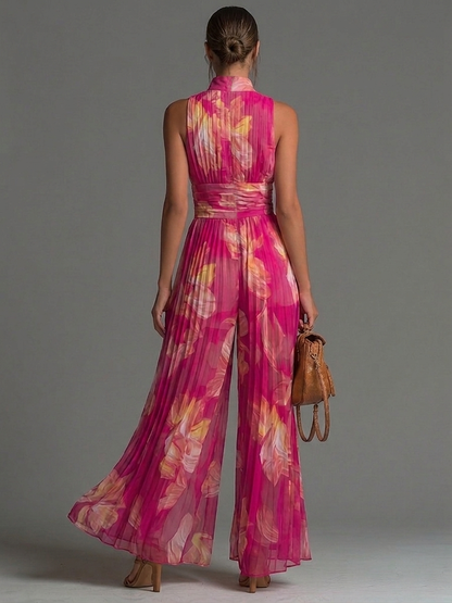 Cristina - Mono de gasa fucsia con estampado floral