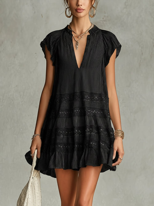 Fiorella - Miniabito a balze in chiffon a righe nere con rifiniture in pizzo