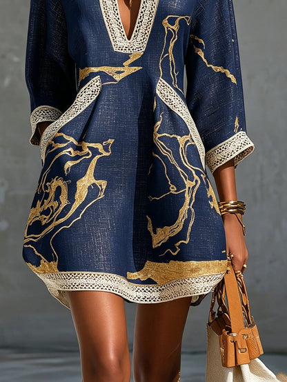 María - Minivestido azul marino con estampado dorado