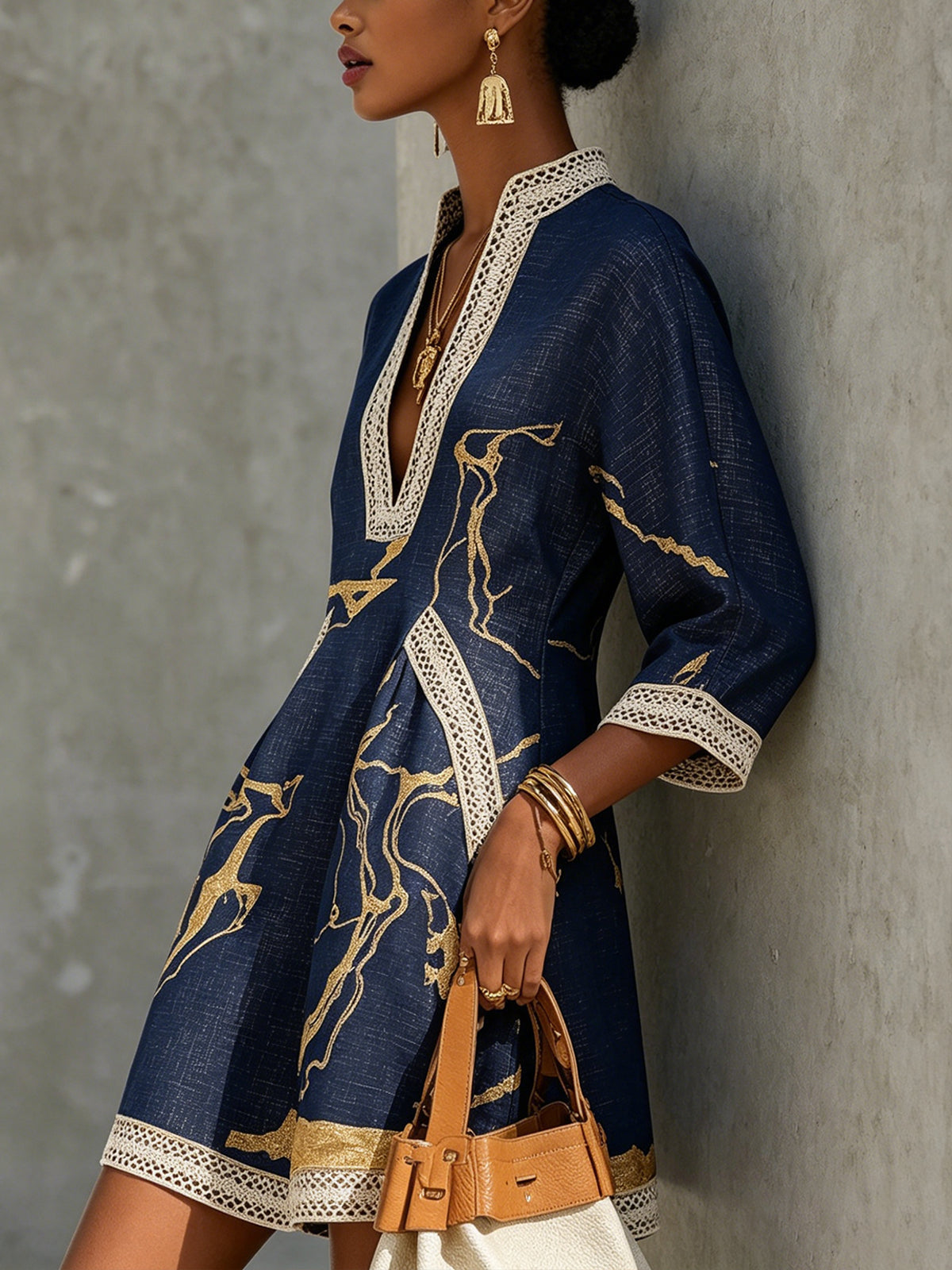 María - Minivestido azul marino con estampado dorado