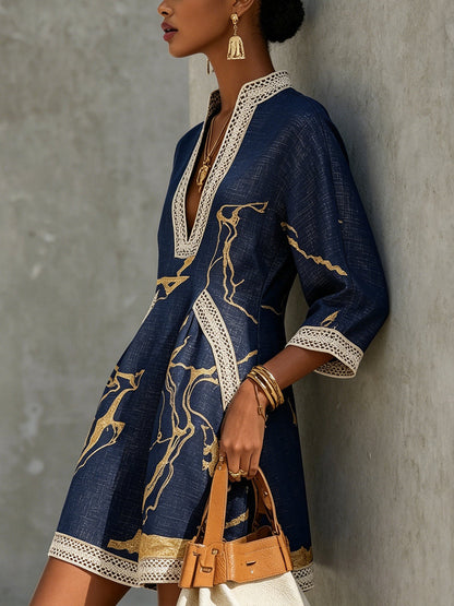 María - Minivestido azul marino con estampado dorado