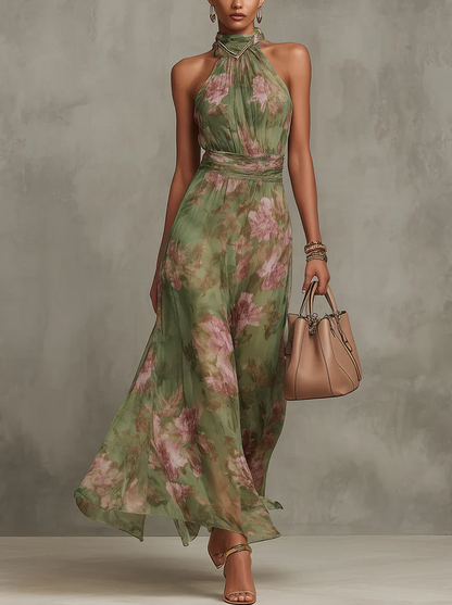 Vestido largo de gasa verde con estampado floral y escote halter