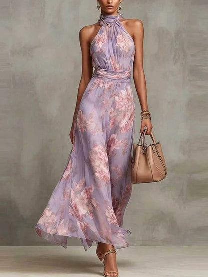 Vestido largo de gasa verde con estampado floral y escote halter